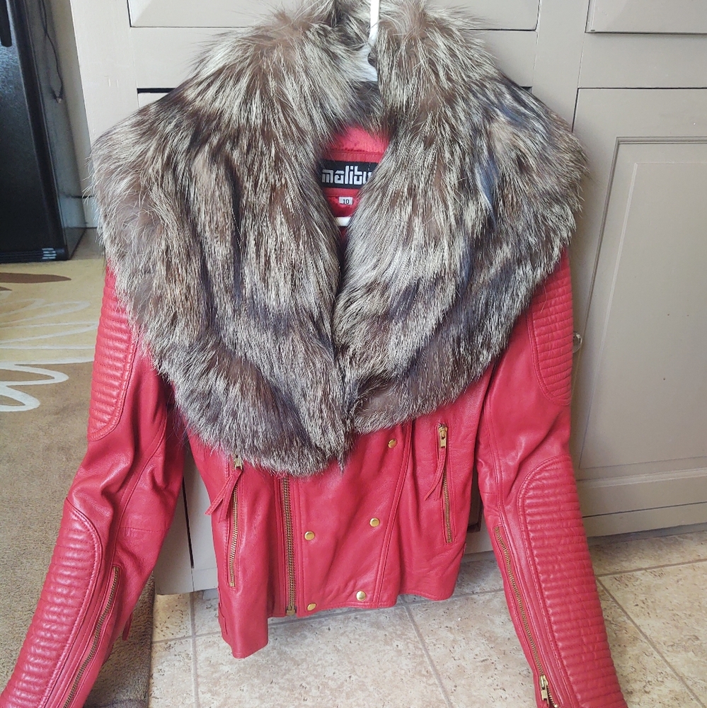Red lambskin jacket with raccoon collar size 8